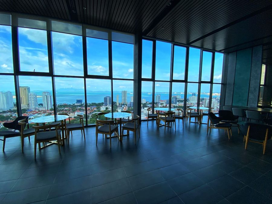 Sky lounge with seating and city views