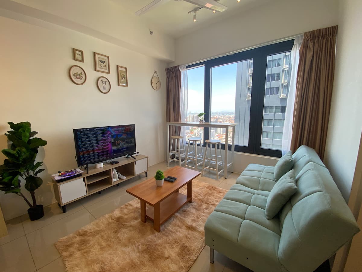 Living room in the Deluxe 2-Bedroom Apartment
